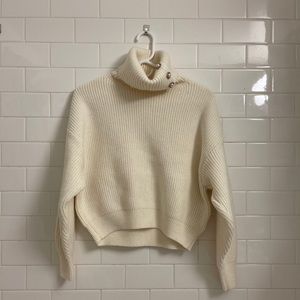 Rib-knit Turtleneck Sweater.